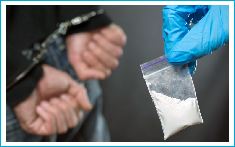 Drug crime with suspect in handcuffs