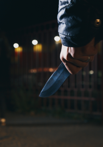 suspect holding a knife