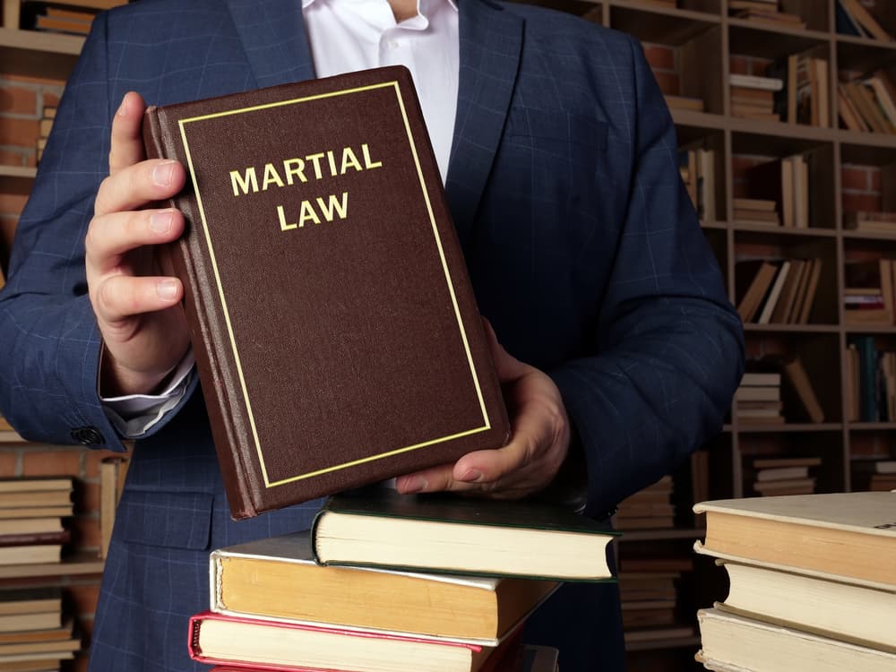 How do I choose a civilian lawyer for court martial proceedings